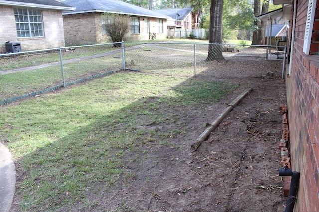 view of yard with central AC unit