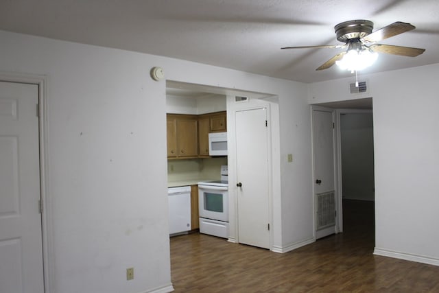 kitchen featuring dark hardwood / wood-style flooring, white appliances, and ceiling fan