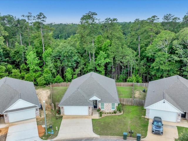829 Village Gate Cir, Nacogdoches, TX 75961 - view of subject property featuring a forest