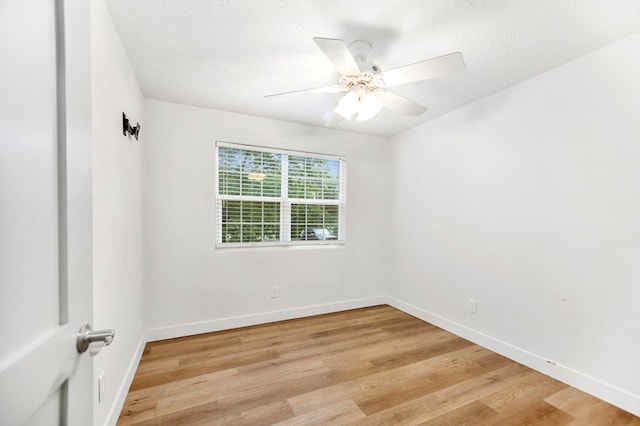 175 Weeks St, Lufkin, TX 75904 - unfurnished room featuring light wood-style floors, ceiling fan, and a textured ceiling