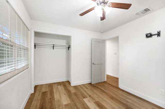 175 Weeks St, Lufkin, TX 75904 - unfurnished bedroom featuring wood finished floors, a closet, and a ceiling fan
