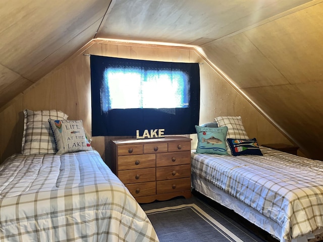 bedroom with lofted ceiling