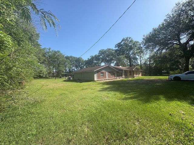 1169 County Road 619, Kirbyville, TX 75956 - view of yard