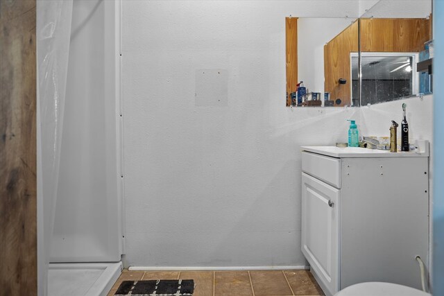 505 S Home St, Corrigan, TX 75939 - full bathroom featuring vanity and a stall shower