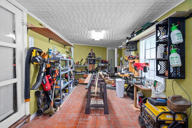 505 S Home St, Corrigan, TX 75939 - miscellaneous room with a workshop area