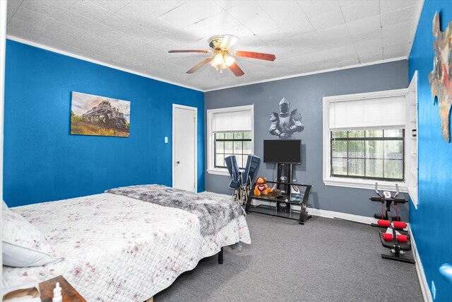 505 S Home St, Corrigan, TX 75939 - bedroom featuring carpet flooring, multiple windows, and ceiling fan