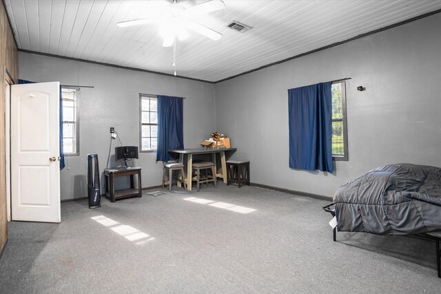 505 S Home St, Corrigan, TX 75939 - bedroom with carpet floors, wooden ceiling, and a ceiling fan