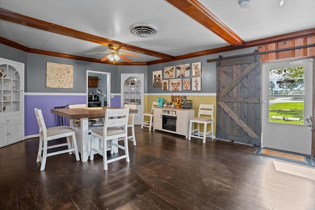 505 S Home St, Corrigan, TX 75939 - dining area with beamed ceiling, a barn door, a ceiling fan, crown molding, and hardwood / wood-style floors