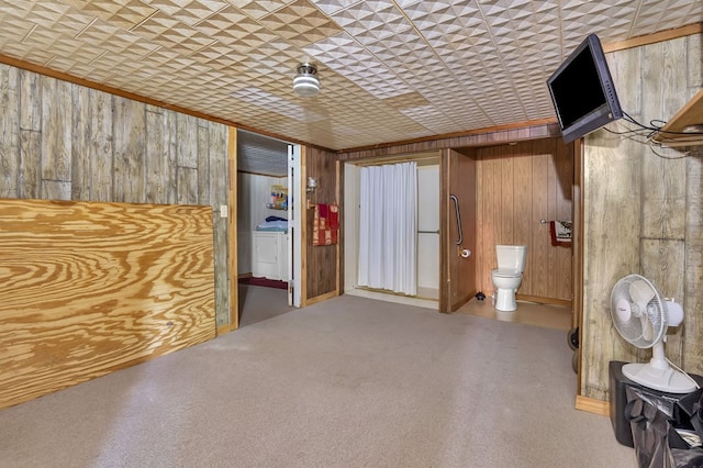 211 Winfree Dr, Hemphill, TX 75948 - unfurnished bedroom with ensuite bathroom, carpet flooring, and wooden walls