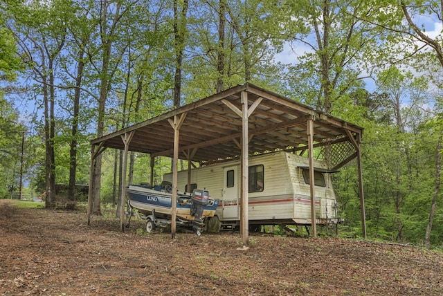211 Winfree Dr, Hemphill, TX 75948 - exterior space with a carport