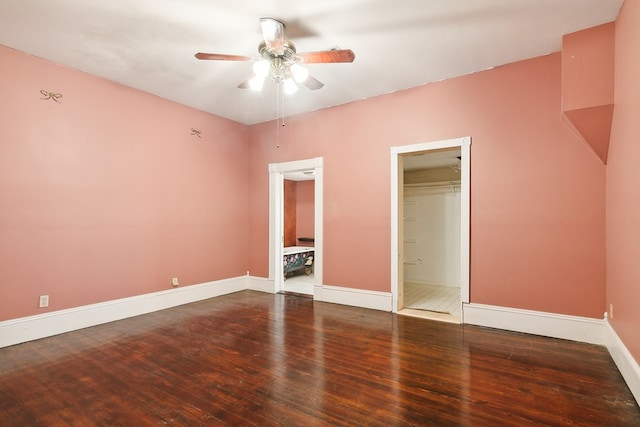 250 Main St, Jasper, TX 75951 - unfurnished bedroom with hardwood / wood-style flooring, baseboards, a closet, and a ceiling fan