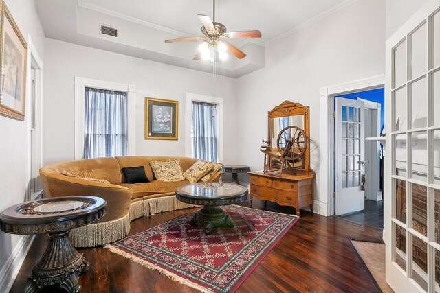 250 Main St, Jasper, TX 75951 - living area featuring wood finished floors, ceiling fan, and crown molding