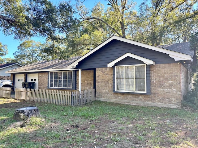 single story home with a garage