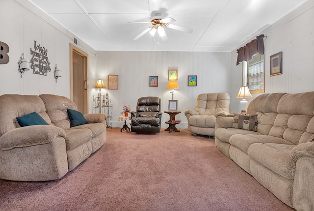 living room featuring ceiling fan and carpet floors