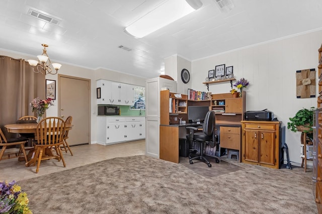 office space with an inviting chandelier and ornamental molding