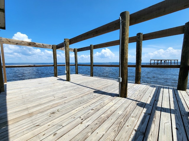 view of dock with a water view