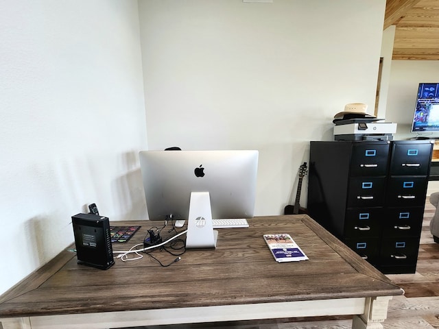 home office featuring wood finished floors