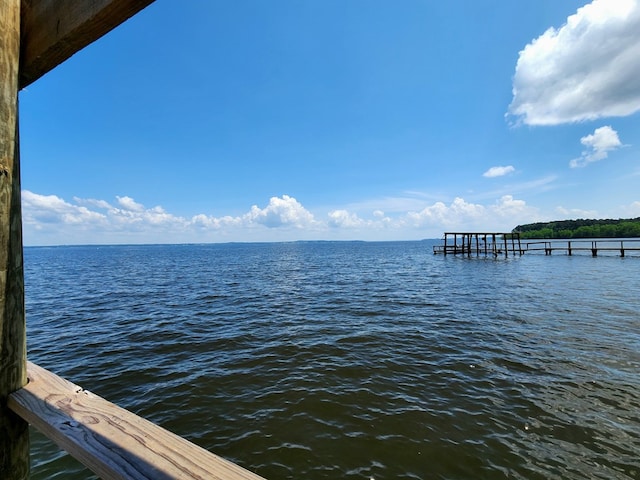 dock area featuring a water view