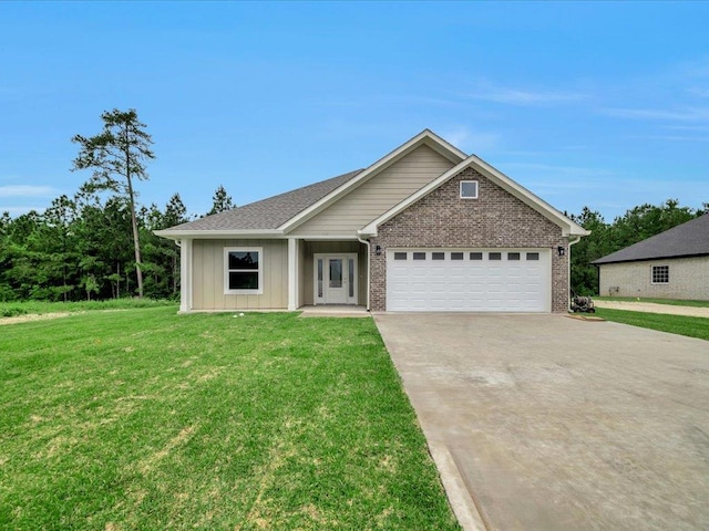 view of front facade featuring an attached garage, brick siding, concrete driveway, a front yard, and board and batten siding
