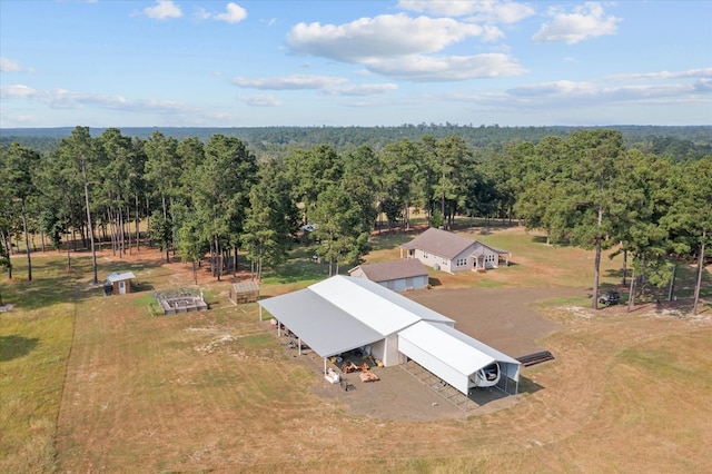 birds eye view of property featuring a rural view