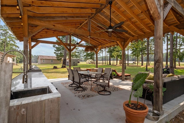 view of patio / terrace with a gazebo and ceiling fan
