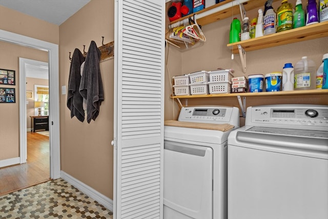 laundry area featuring washing machine and dryer