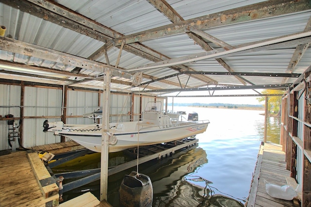 dock area with a water view