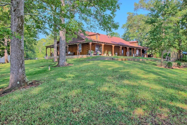 exterior space with a front yard