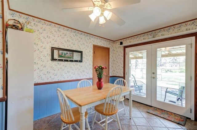 tiled dining area with french doors and ceiling fan