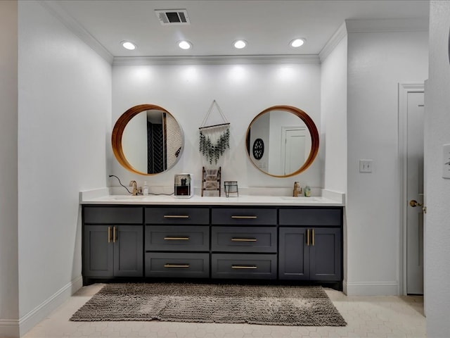 bathroom featuring tile patterned floors, vanity, and ornamental molding