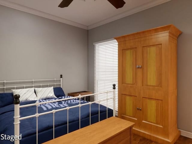 12 Columbia Ct, Lufkin, TX 75901 - bedroom featuring wood finished floors, crown molding, multiple windows, ceiling fan, and baseboards
