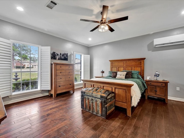 bedroom featuring ceiling fan, dark hardwood / wood-style flooring, ornamental molding, and a wall unit AC