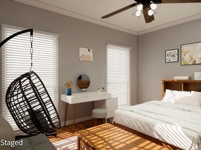 12 Columbia Ct, Lufkin, TX 75901 - bedroom with crown molding, wood finished floors, a ceiling fan, and baseboards