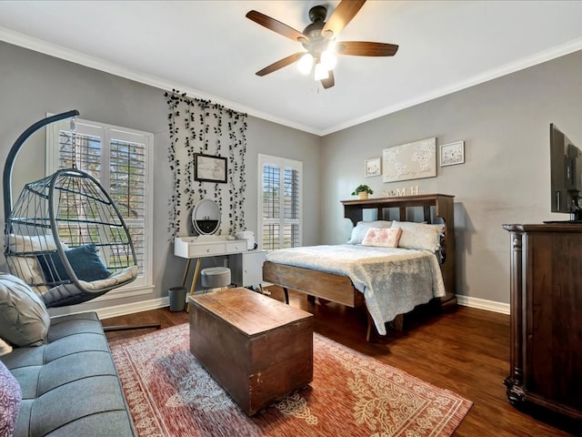 bedroom featuring ceiling fan, dark wood-type flooring, and multiple windows