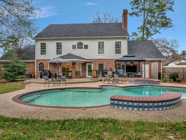 12 Columbia Ct, Lufkin, TX 75901 - view of swimming pool featuring a gazebo, an in-ground hot tub, a patio area, and a grill
