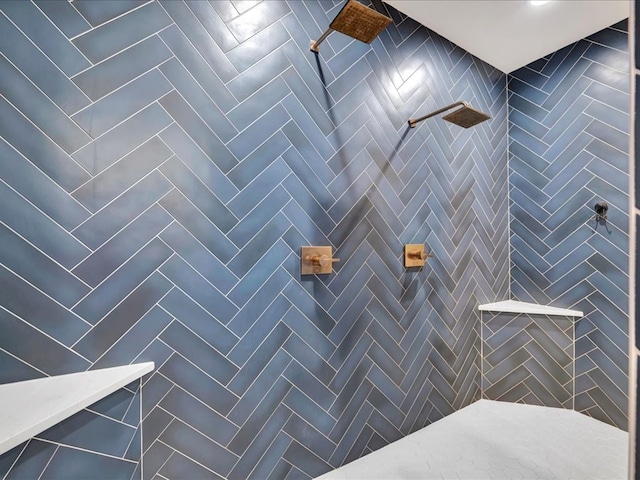 bathroom featuring a tile shower