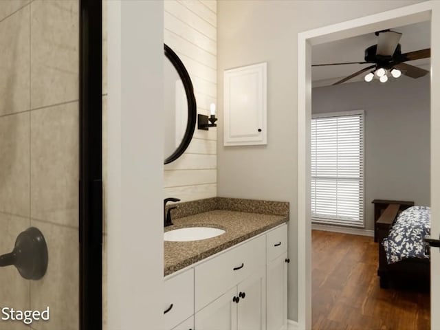 12 Columbia Ct, Lufkin, TX 75901 - bathroom featuring wood finished floors, vanity, a ceiling fan, and baseboards