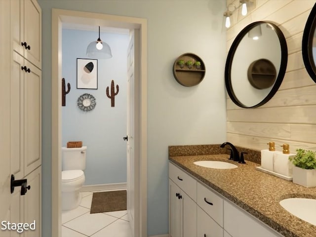 12 Columbia Ct, Lufkin, TX 75901 - bathroom with double vanity, toilet, and tile patterned flooring