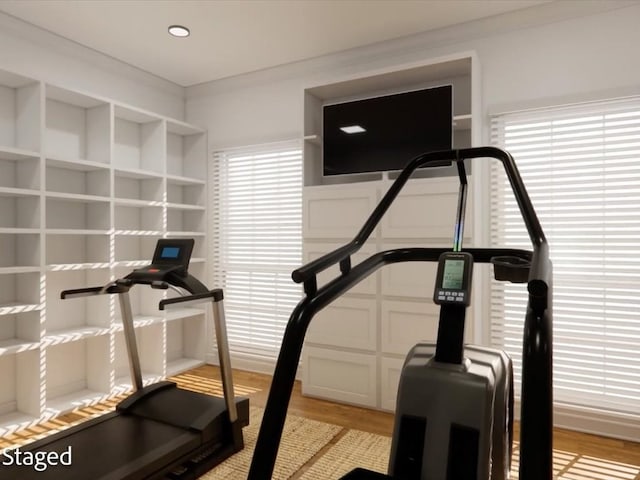 12 Columbia Ct, Lufkin, TX 75901 - workout room featuring light wood-type flooring and crown molding