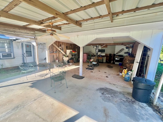 view of patio featuring ceiling fan