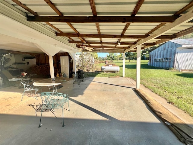 view of patio featuring ceiling fan