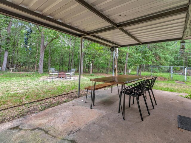 view of patio / terrace with a fire pit