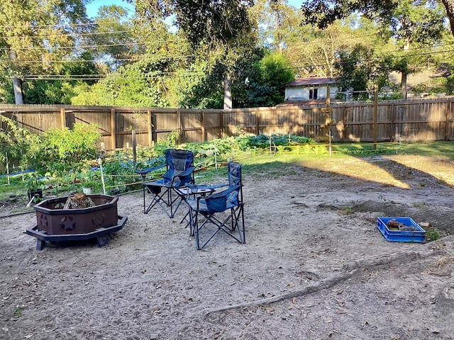 view of patio with an outdoor fire pit