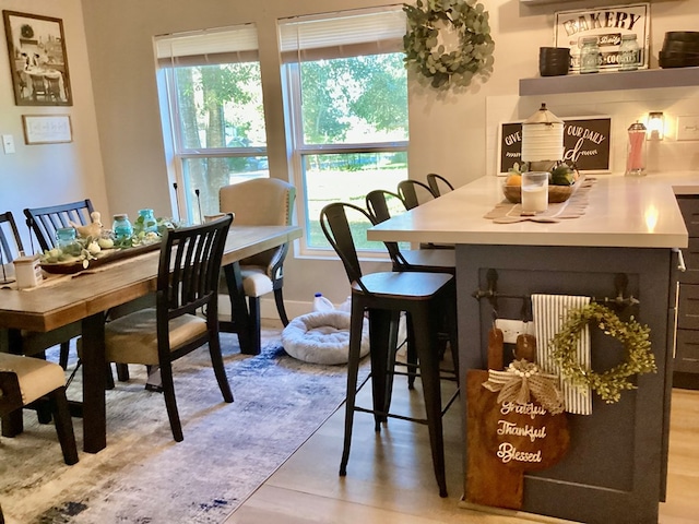 dining room with light wood-type flooring