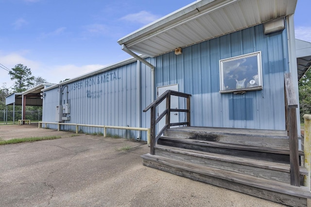 entrance to property with a patio area