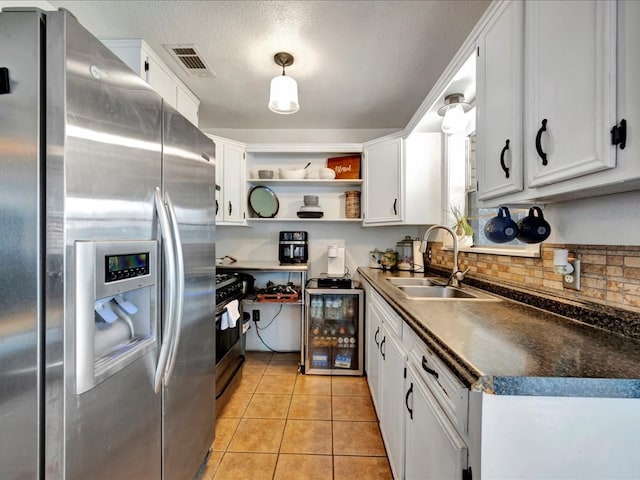 kitchen featuring white cabinets and stainless steel appliances