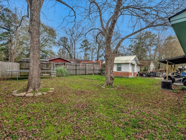 view of yard featuring a trampoline