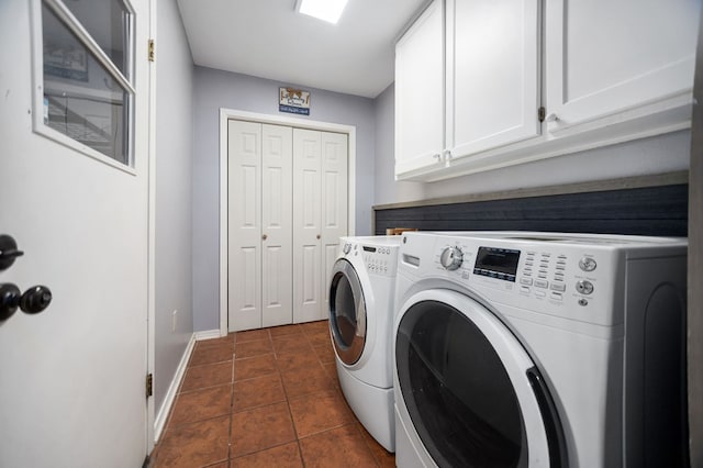 206 Spyglass Dr, Lufkin, TX 75901 - laundry room with independent washer and dryer, cabinet space, and dark tile patterned flooring