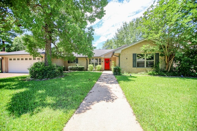 206 Spyglass Dr, Lufkin, TX 75901 - ranch-style home featuring brick siding, a front lawn, a garage, and driveway