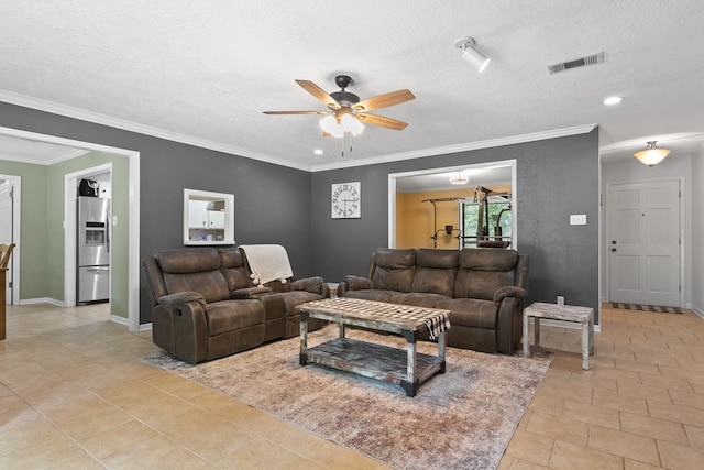920 Richardson Dr, Jasper, TX 75951 - living area with a ceiling fan, a textured ceiling, crown molding, recessed lighting, and baseboards
